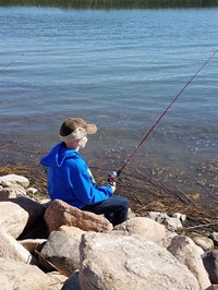 Student fishing (PBIS Celebration/DNR Day! Fall 2017)