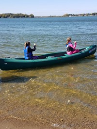 Two students in canoe (PBIS Celebration/DNR Day! Fall 2017)