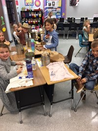 Students at desks (2nd Grade Pioneer Day - Fall 2017)