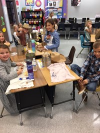 Students dressed in pioneer clothes (2nd Grade Pioneer Day - Fall 2017)