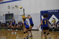 Volleyball player bumping the volleyball