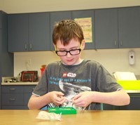 Boy doing shape puzzle