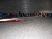 GHV First grade students visiting farm and standing in grain bin