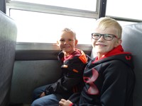 GHV First grade students on the bus to their farm field trip