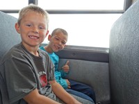 GHV First grade students on the bus to their farm field trip
