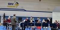 Junior high students playing in a band concert