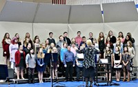 Junior high students singing in a vocal concert