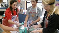 Students conducting an experiment in science class