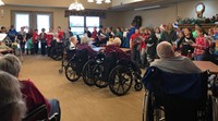 students singing at the local nursing home