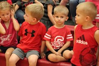 Elementary students in the stands at a pep rally