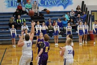 Basketball player going up for a shot