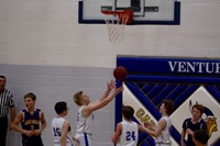 Basketball player rebounding the ball