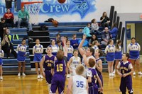 Basketball player putting up a shot