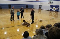 A student helping with the K-9 presentation