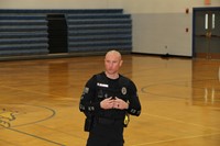 A police officer explaining the training process for police dogs