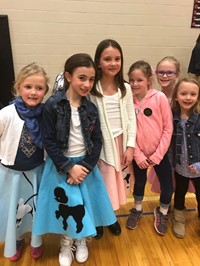 Elementary students dressed in 50's clothing