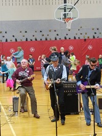 Elementary students dancing in gym