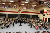 A group of students playing at a band concert