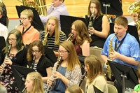 Junior high band member playing 