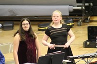 Two percussionists waiting to perform