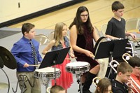 Percussionists performing in a band concert
